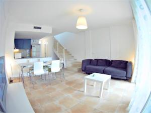 Posedenie v ubytovaní VACAY Villa Anna, jardín privado, piscina comunitaria, en Costa Brava, L'Escala!