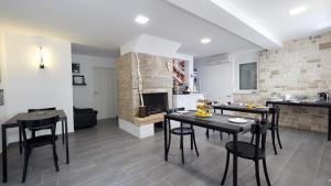 Kuchyň nebo kuchyňský kout v ubytování B&B Villa Vela