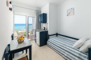 Postel nebo postele na pokoji v ubytování Kozas Superior Apartments