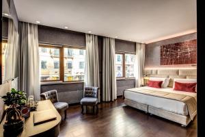 Postel nebo postele na pokoji v ubytování Prassede Palace Hotel