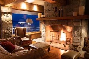 Et opholdsområde på Cacique Inacayal Lake Hotel & Spa + 81 billeder