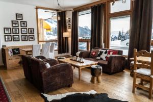 Posezení v ubytování Hôtel Le Relais Alpin