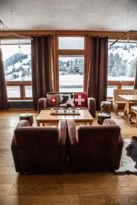 Posezení v ubytování Hôtel Le Relais Alpin