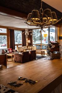 Posezení v ubytování Hôtel Le Relais Alpin