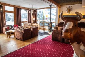 Posezení v ubytování Hôtel Le Relais Alpin