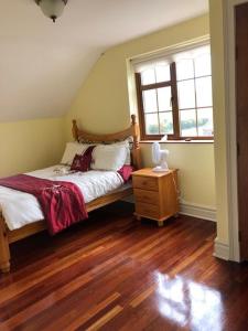 Postel nebo postele na pokoji v ubytování Beautiful Home on Lake Carrowmore