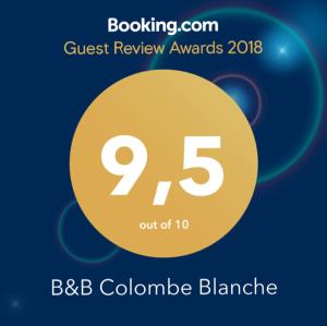 a sign that reads guest review awards with a yellow circle at B&B Colombe Blanche in Knokke-Heist