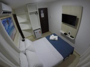 Postel nebo postele na pokoji v ubytování Pousada Kanoas