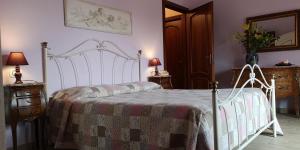 Postel nebo postele na pokoji v ubytování B&B Paola e Francesco