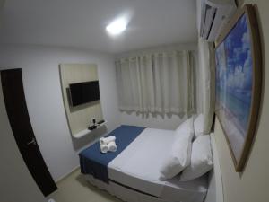 Postel nebo postele na pokoji v ubytování Pousada Kanoas