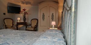 Postel nebo postele na pokoji v ubytování B&B Paola e Francesco
