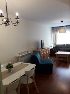 A seating area at Apartamento en c/ Peroneros