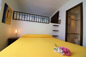 Ένα ή περισσότερα κρεβάτια σε δωμάτιο στο Les Teules 3B Roses - Immo Barneda