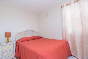 Postel nebo postele na pokoji v ubytování Rosewood Apartment Hotel