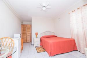 Postel nebo postele na pokoji v ubytování Rosewood Apartment Hotel