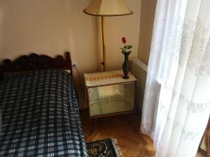 Postel nebo postele na pokoji v ubytování Apartment Erekle