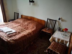Rúm í herbergi á Apartment Erekle