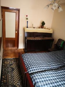 Rúm í herbergi á Apartment Erekle