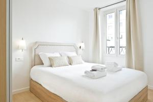 Lova arba lovos apgyvendinimo įstaigoje Pick A Flat's Apartment rue d'Avron - Nation