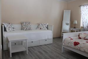 A bed or beds in a room at Apartmany St. Maria