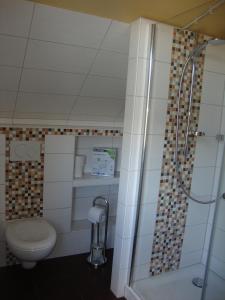 Ванная комната в Ferienwohnung Quaiser