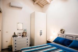 A bed or beds in a room at Mediterranean house