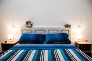 A bed or beds in a room at Mediterranean house