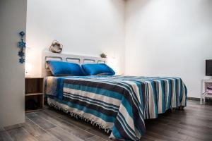 A bed or beds in a room at Mediterranean house