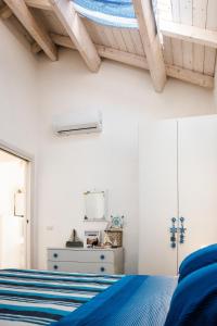 A bed or beds in a room at Mediterranean house