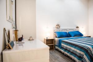 A bed or beds in a room at Mediterranean house