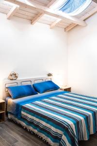 A bed or beds in a room at Mediterranean house