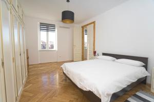 Posteľ alebo postele v izbe v ubytovaní Apartman Bianca