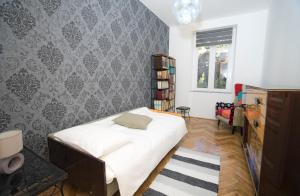 Posteľ alebo postele v izbe v ubytovaní Apartman Bianca