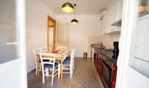Kuchyňa alebo kuchynka v ubytovaní Apartman Bianca