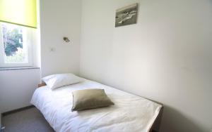 Posteľ alebo postele v izbe v ubytovaní Apartman Bianca