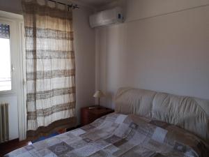 A bed or beds in a room at Checchi House