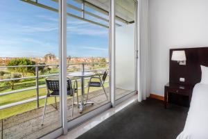 Balcon ou terrasse dans l'établissement B&B HOTEL Cantanhede Coimbra