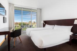 Un ou plusieurs lits dans un hébergement de l'établissement B&B HOTEL Cantanhede Coimbra