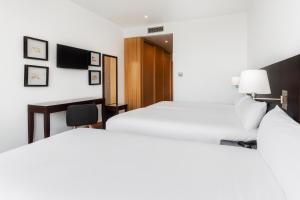 Un ou plusieurs lits dans un hébergement de l'établissement B&B HOTEL Cantanhede Coimbra