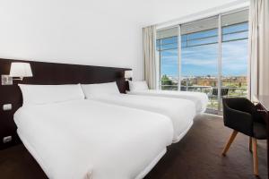 Un ou plusieurs lits dans un hébergement de l'établissement B&B HOTEL Cantanhede Coimbra