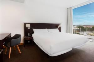 Un ou plusieurs lits dans un hébergement de l'établissement B&B HOTEL Cantanhede Coimbra