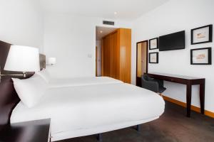 Télévision ou salle de divertissement dans l'établissement B&B HOTEL Cantanhede Coimbra