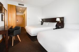 Un ou plusieurs lits dans un hébergement de l'établissement B&B HOTEL Cantanhede Coimbra