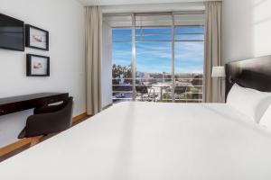 Un ou plusieurs lits dans un hébergement de l'établissement B&B HOTEL Cantanhede Coimbra
