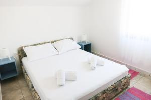 Ein Bett oder Betten in einem Zimmer der Unterkunft Vila Virago