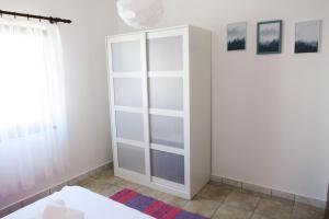 Ein Bett oder Betten in einem Zimmer der Unterkunft Vila Virago