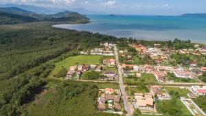 an aerial view of a town next to a body of water at Quinta Brasilis Boutique Hotel Paraty in Paraty