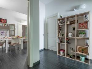 a room with a table and a dining room at Affittacamere Sa Pardula in Cagliari