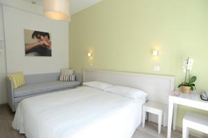 Posteľ alebo postele v izbe v ubytovaní Maree Hotel