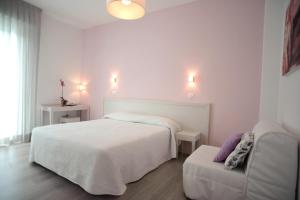 Posteľ alebo postele v izbe v ubytovaní Maree Hotel